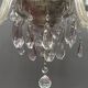 Venetian chandelier decorated with clear crystal and rare coloured crystal.