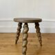 Wooden tripod stool
