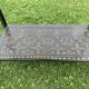 Carved wooden quadrupedal pedestal table