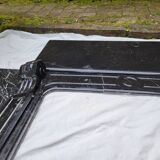 Pompadour fireplace with black marble modillions