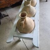Antique painted wooden jar holder with 4 earthenware jars