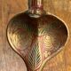 Chiseled brass cobra candlestick