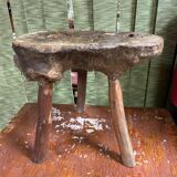 Old brutalist design wooden tripod stool