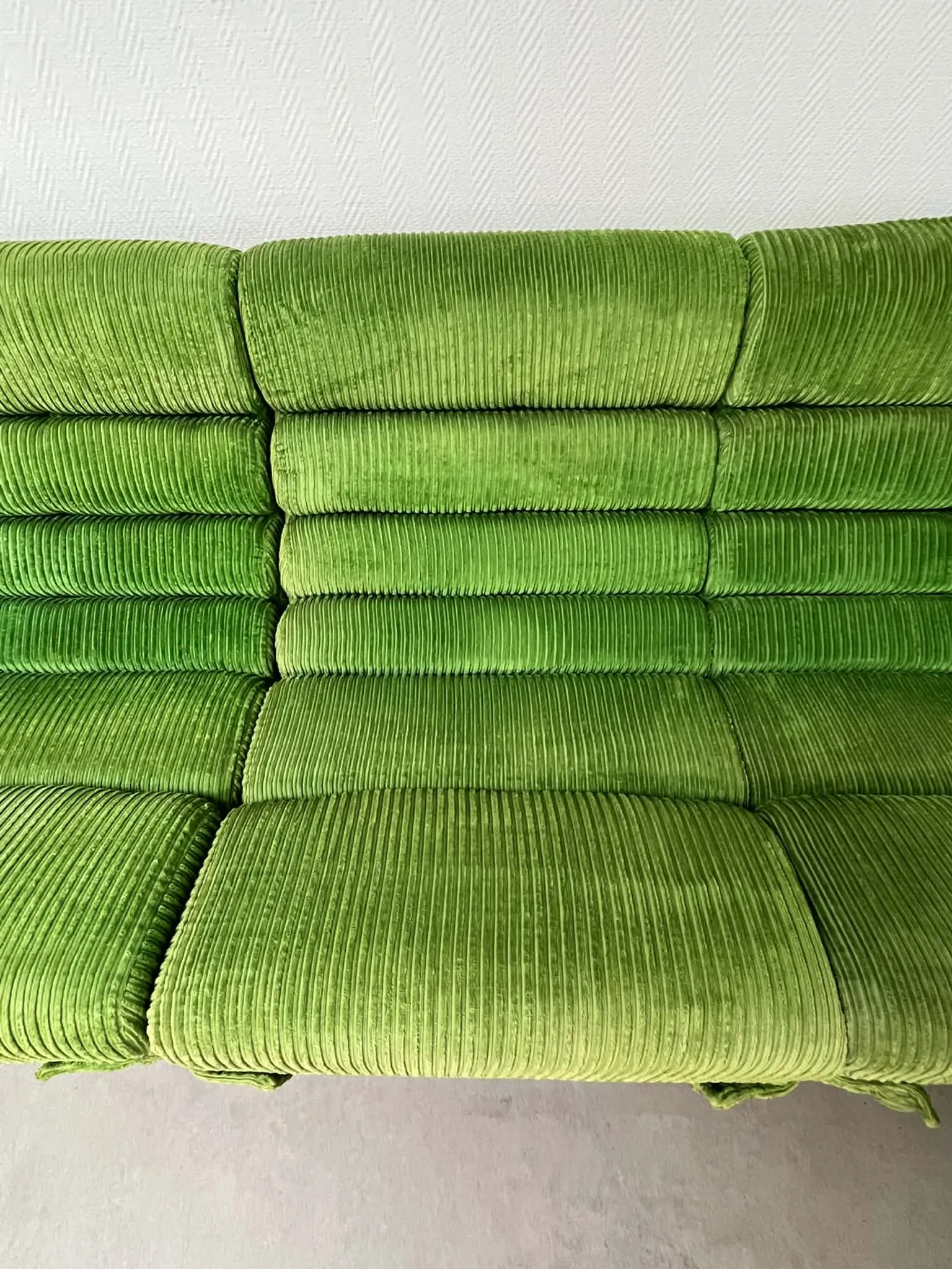Modular green velvet corner sofa, 1970s