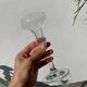 Pair of clear glass candlesticks, signed