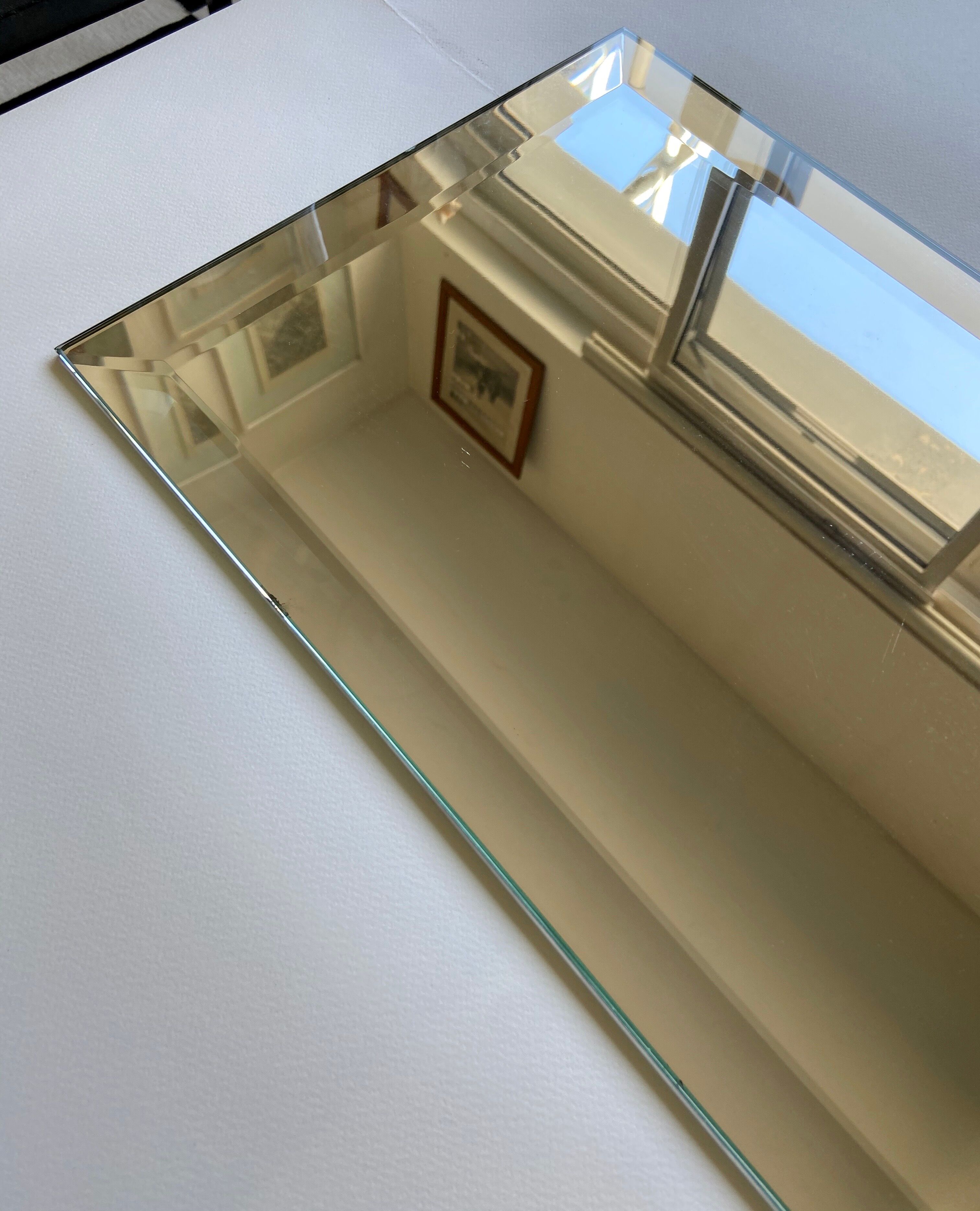 Bevelled mirror 29.5 x 64.5 cm