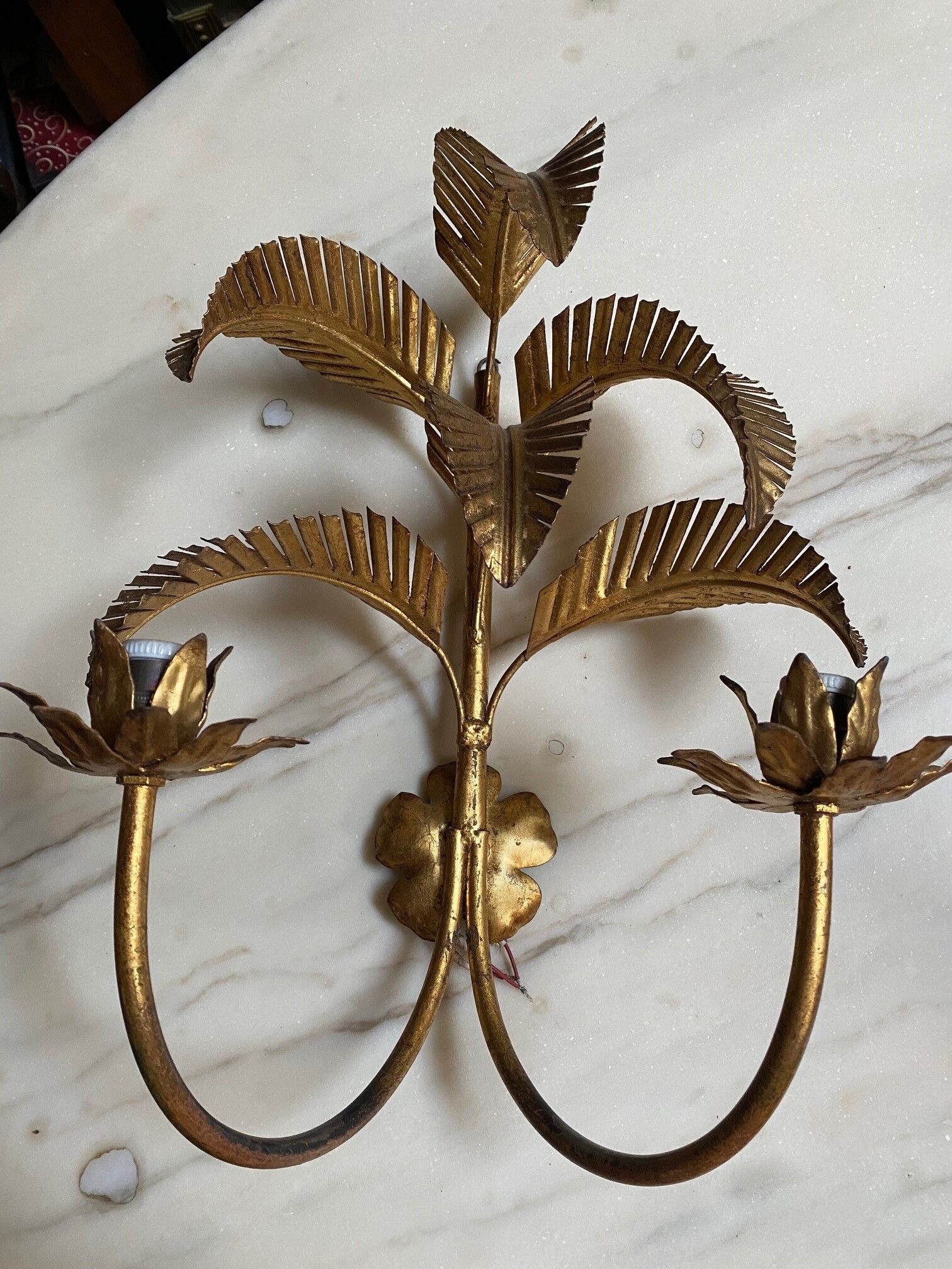 Pair of vintage golden palm leaf sconces