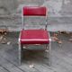 Pair of red leatherette chairs