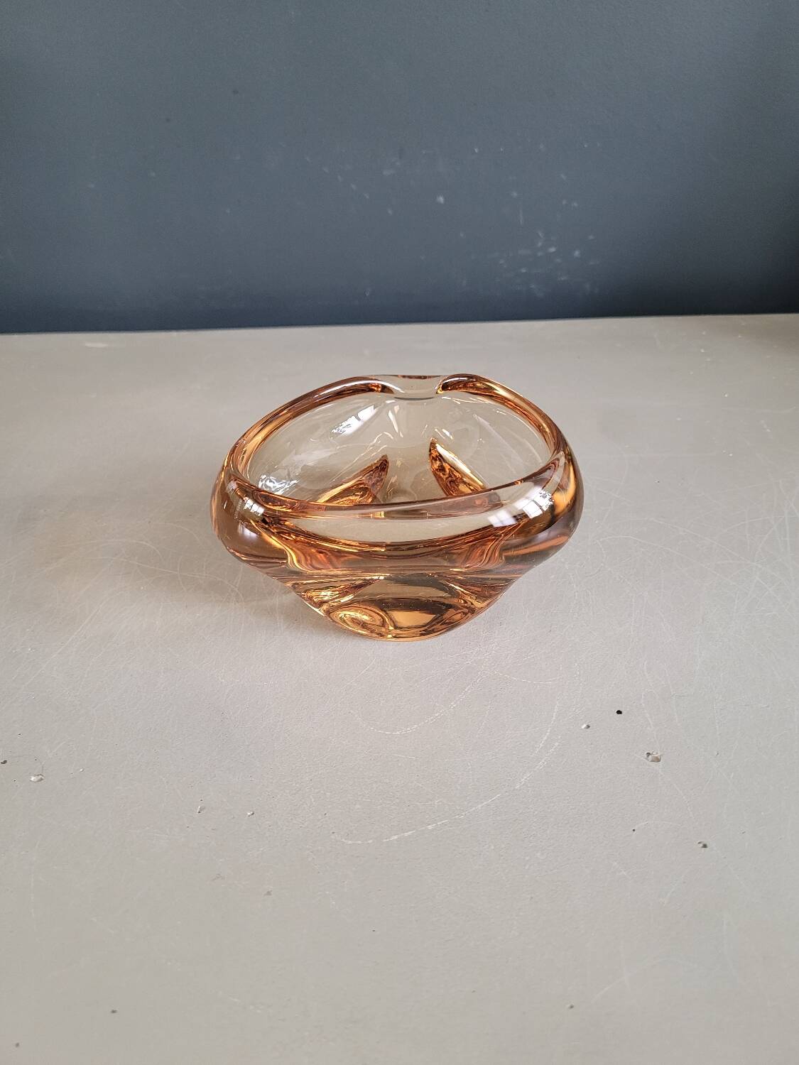 Vintage amber tinted glass ashtray