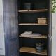 Ancienne Armoire parisienne d’école bois chêne noir