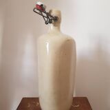 Triangular stoneware bottle
