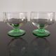 2 faceted champagne glasses with green feet, 1930s