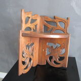 Old corner shelf in worked wood
