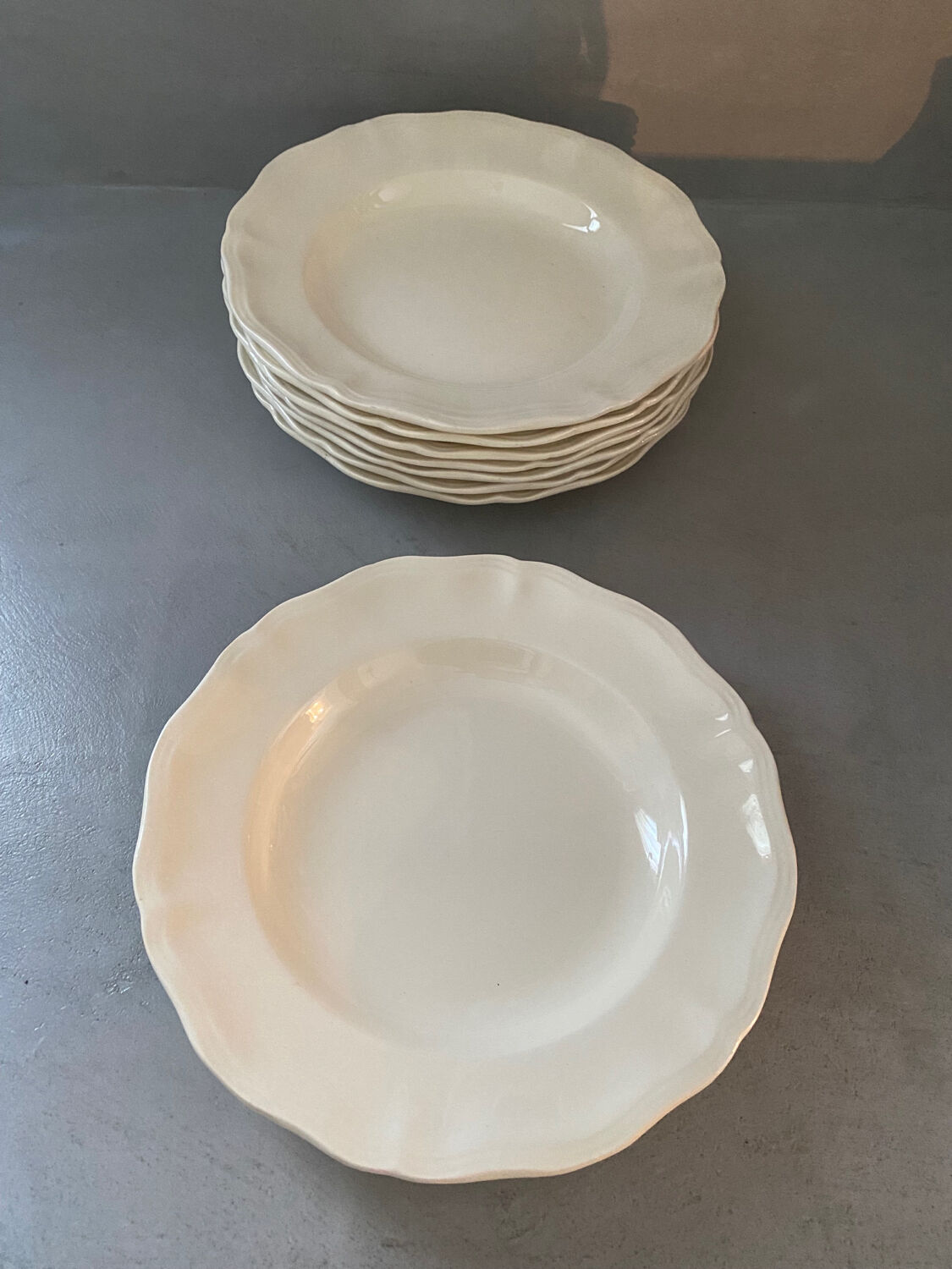 8 white porcelain plates