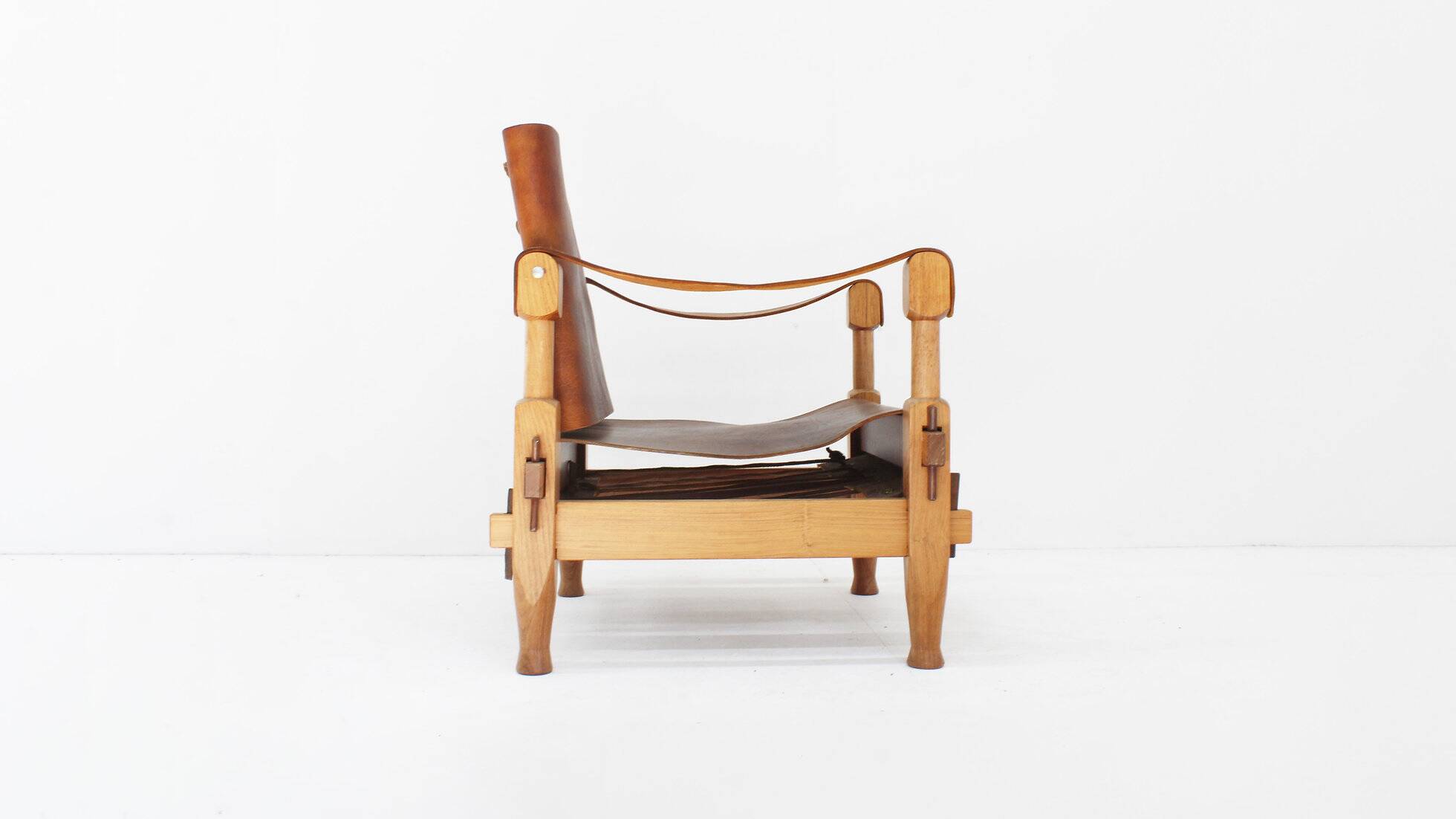 Vintage brutalist wood and cognac leather safari armchair, 1960s