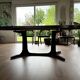 Baumann oval extendable dining room table and 6 Baumann Sled chairs known as gondola