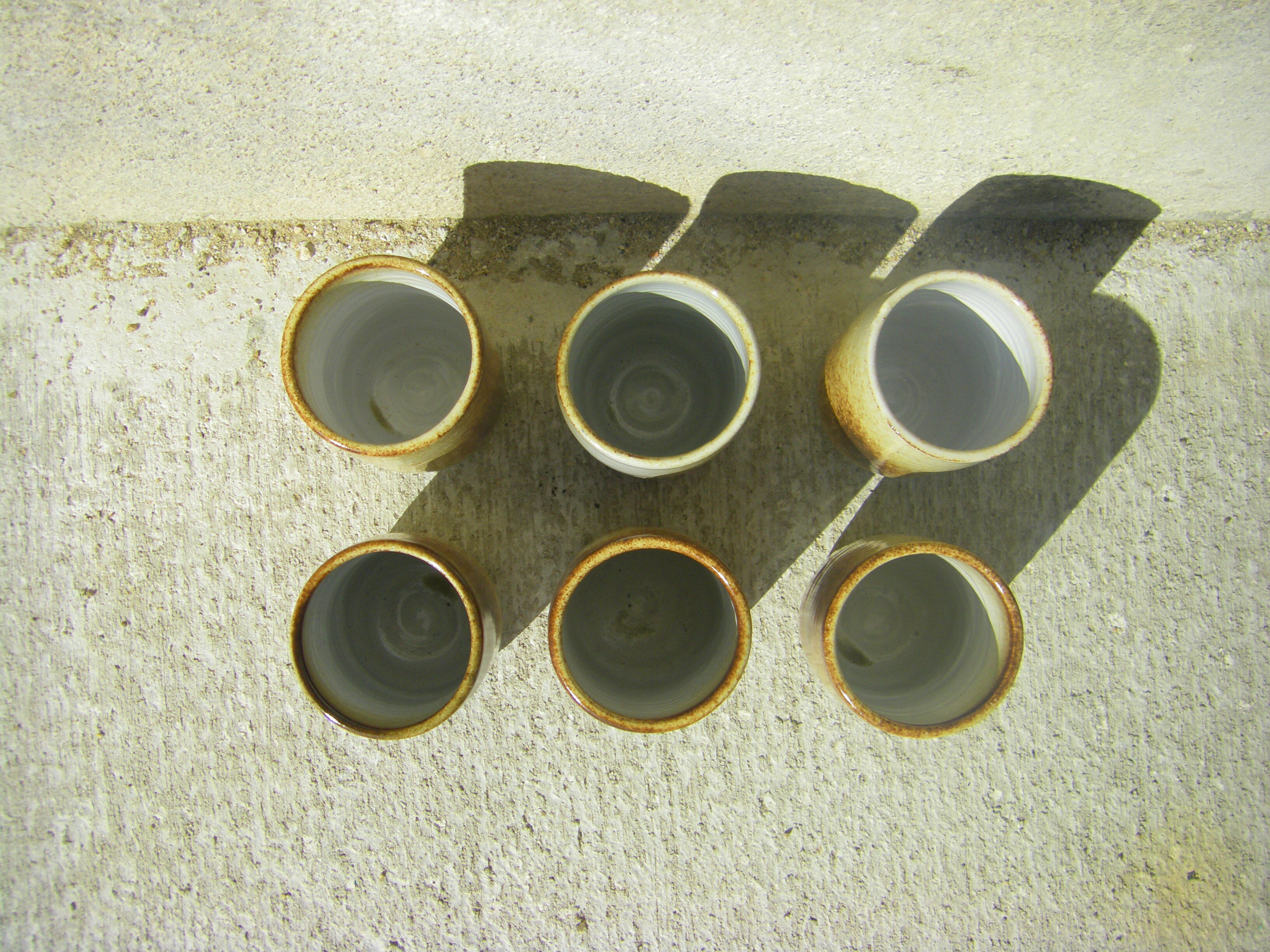 Six sandstone glasses