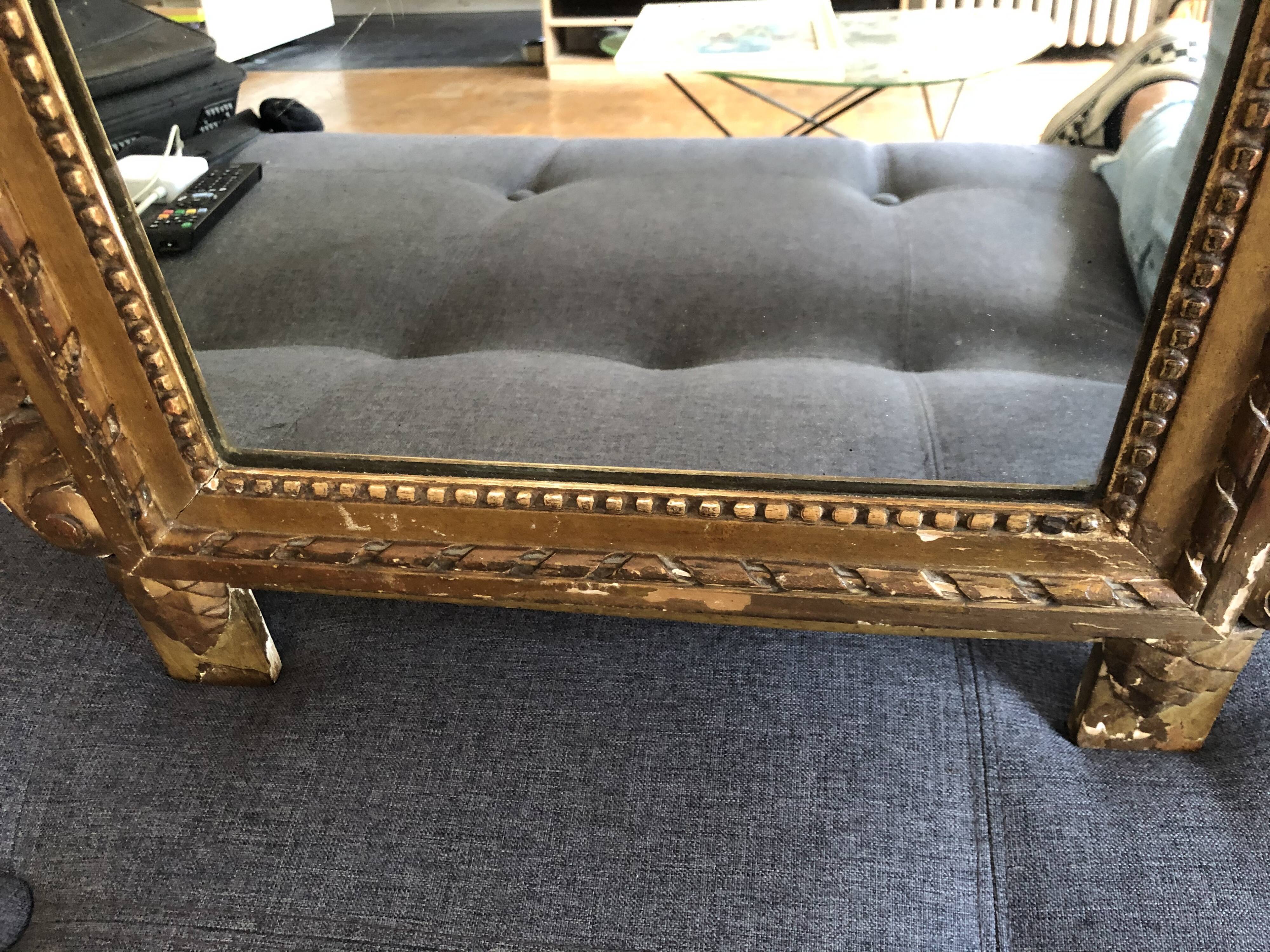 Gilded wooden pediment mirror