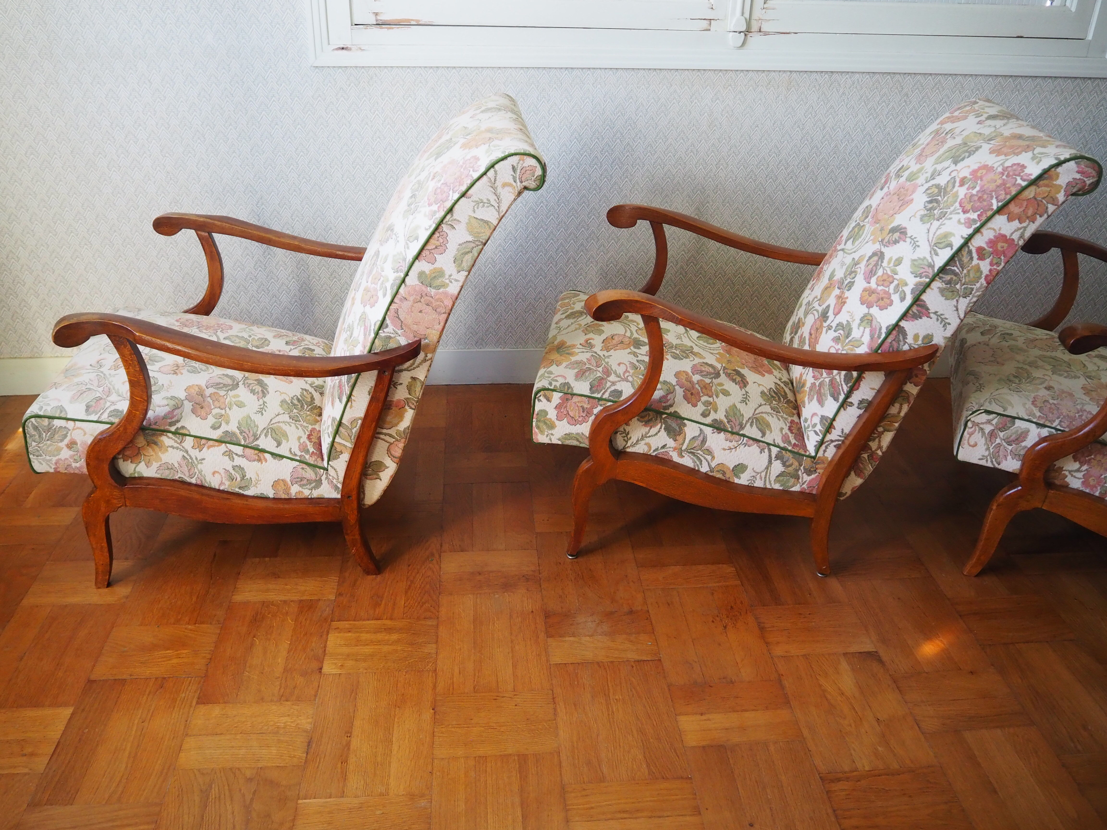 Four 1950s armchairs - wooden armrests