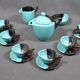 Vallauris coffee service in black and turquoise earthenware.