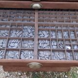 Printing cabinet 16 drawers with these lead letters