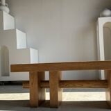 Banc en bois massif piètement ajouré traversé par un cylindre - Teck