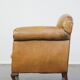 Fauteuil ancien en cuir de mouton