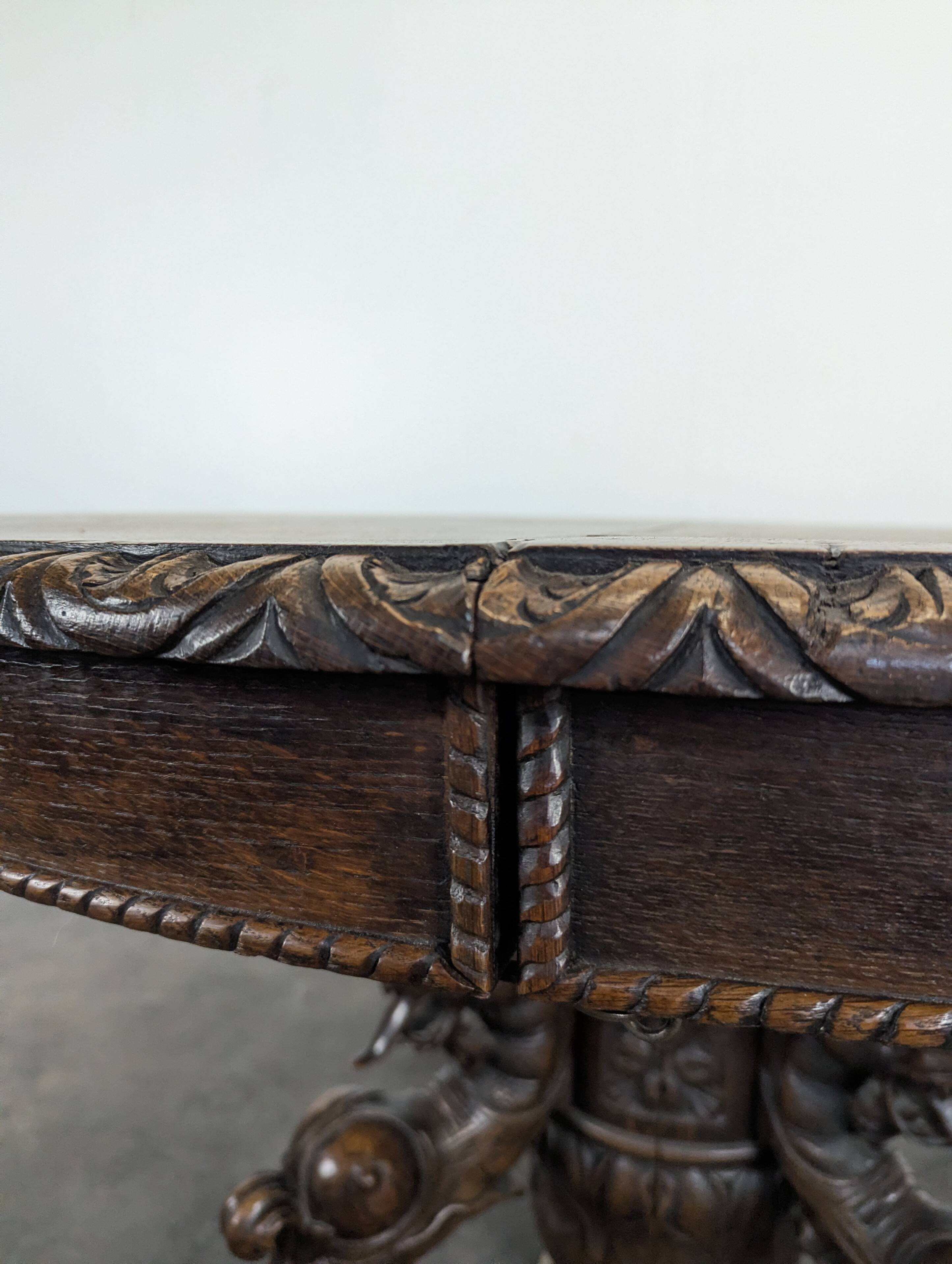 Renaissance-style gueridon with dragon heads in oak