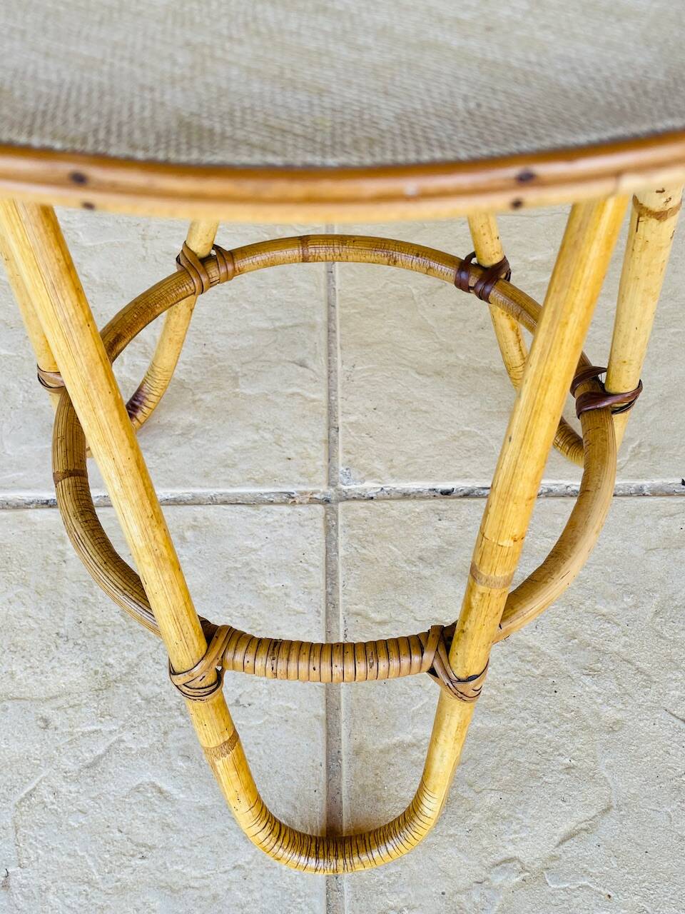 Vintage rattan and bamboo side table, circa 1969.