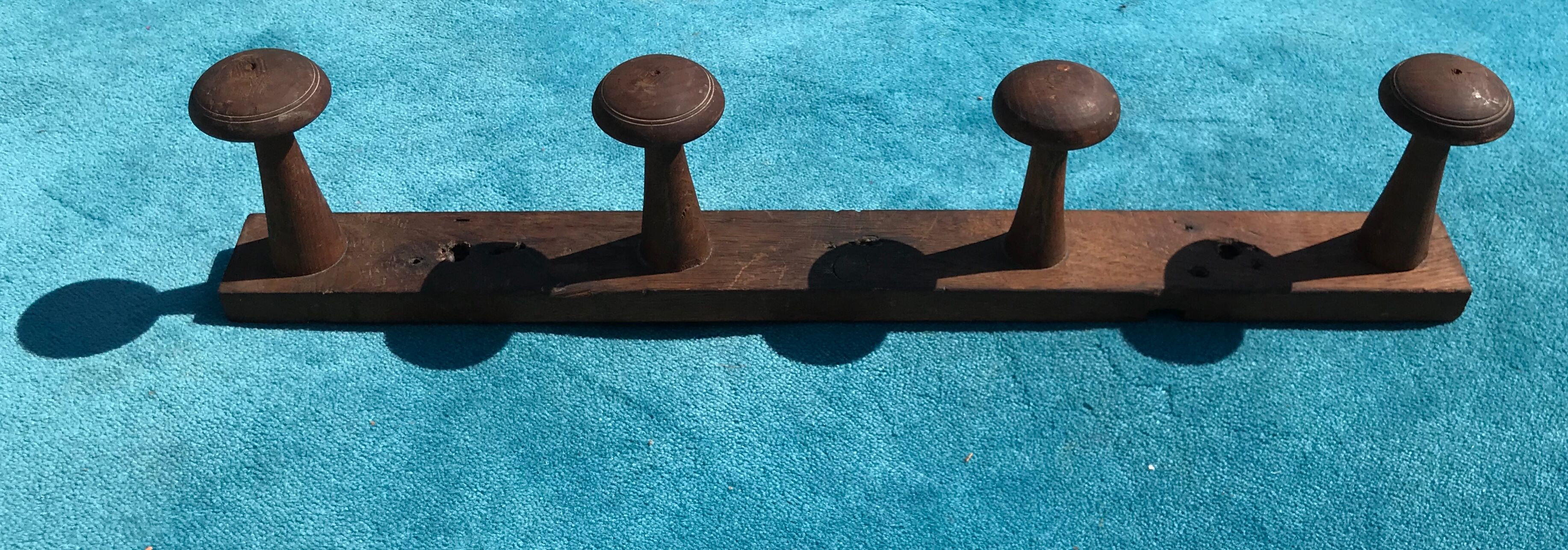 Wooden wall coat holder