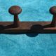 Wooden wall coat holder