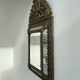 Small mirror with brass parcloses in repoussé style Louis XIV, late 19th century.