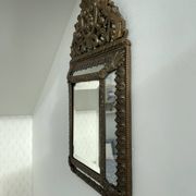 Small mirror with brass parcloses in repoussé style Louis XIV, late 19th century.