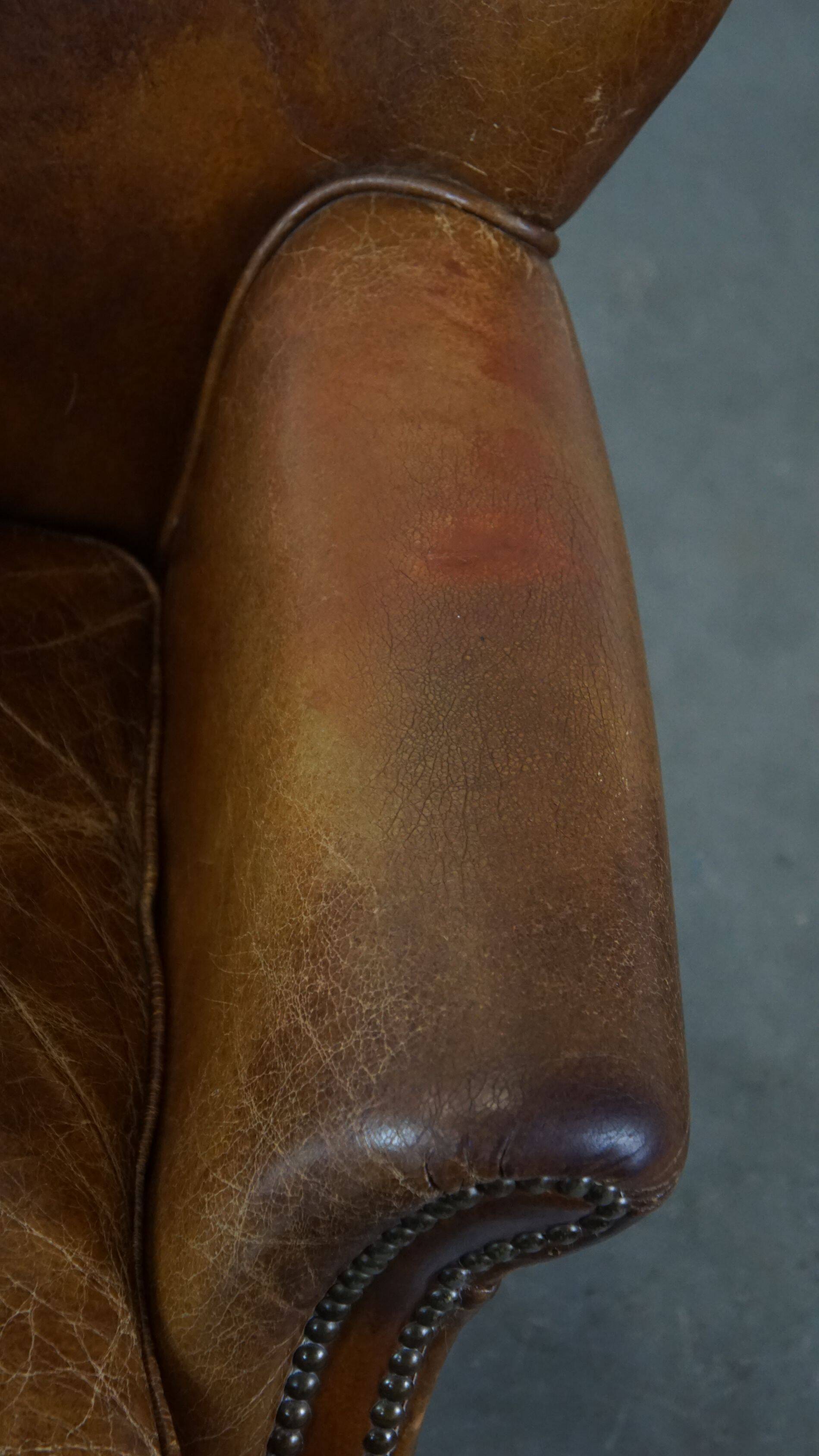 Cognac-colored subtle armchair