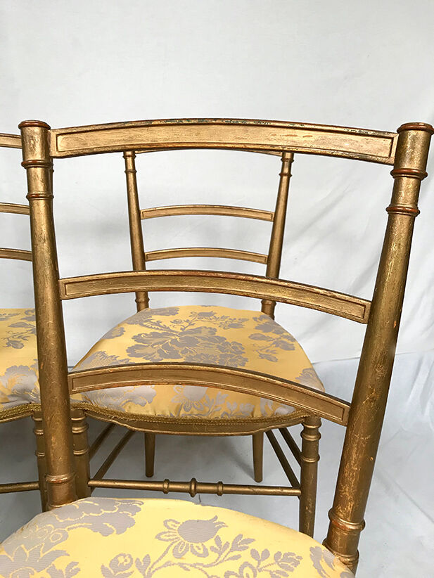 Series of four chairs Napoleon III, gilded wood