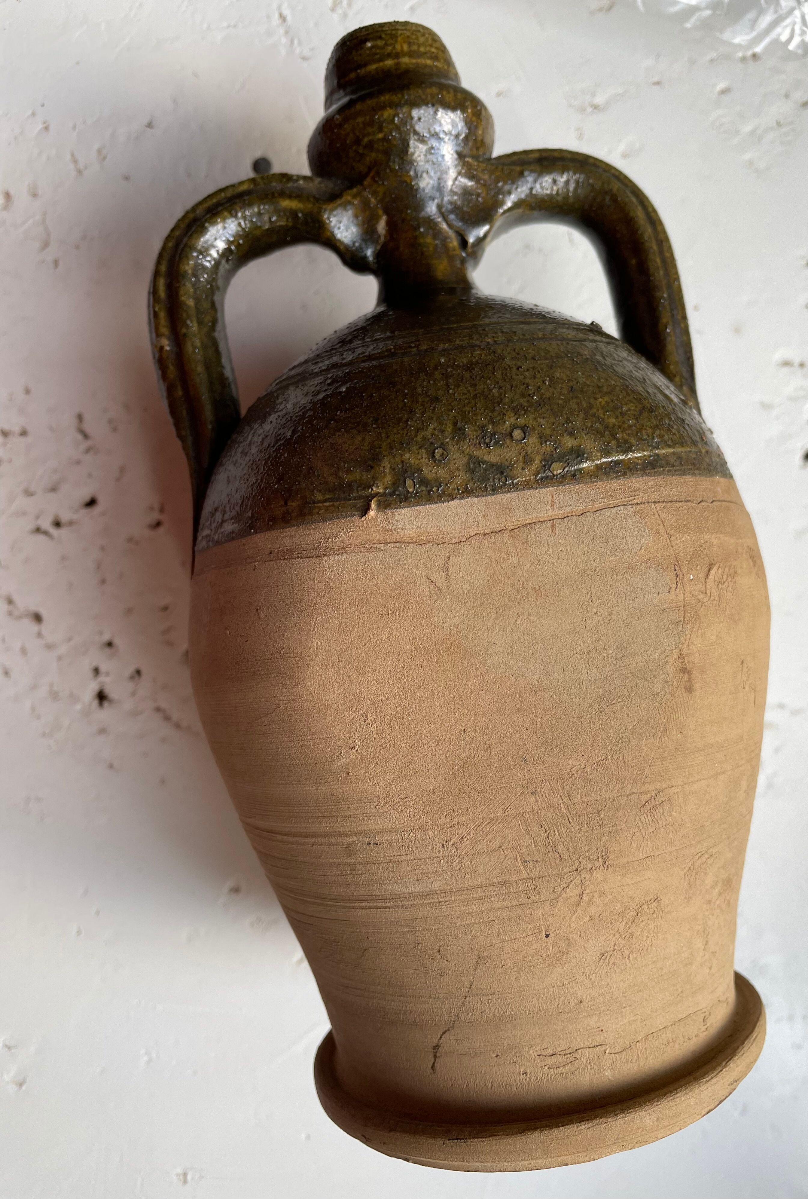 Persimmon glazed terracotta oil jar