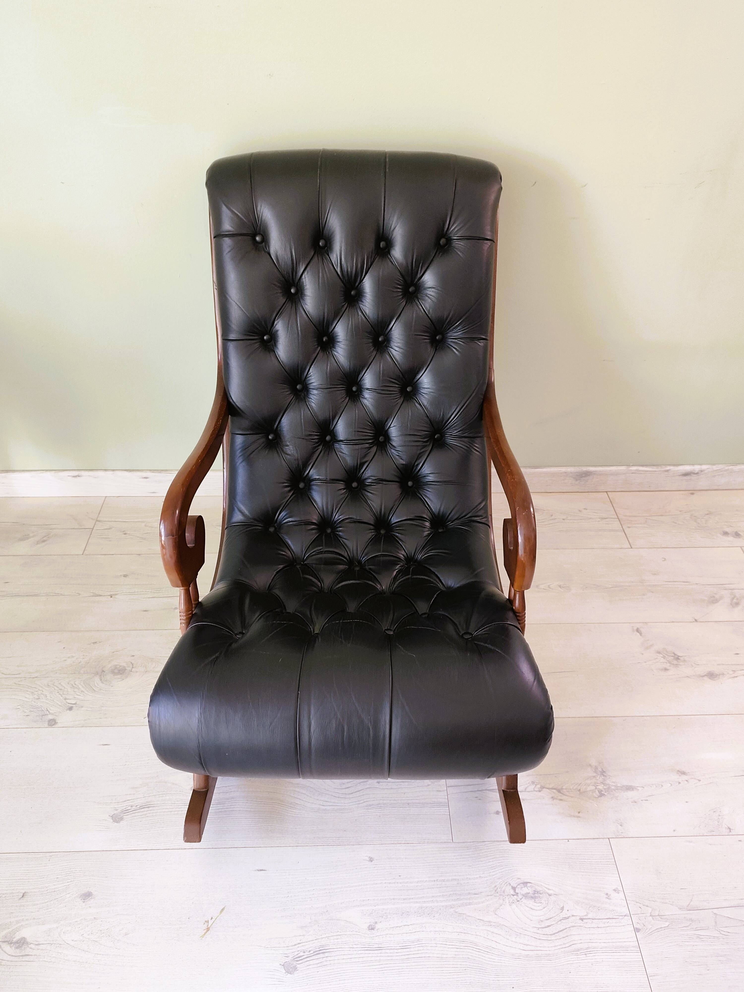 Black leather rocking Chesterfield armchair