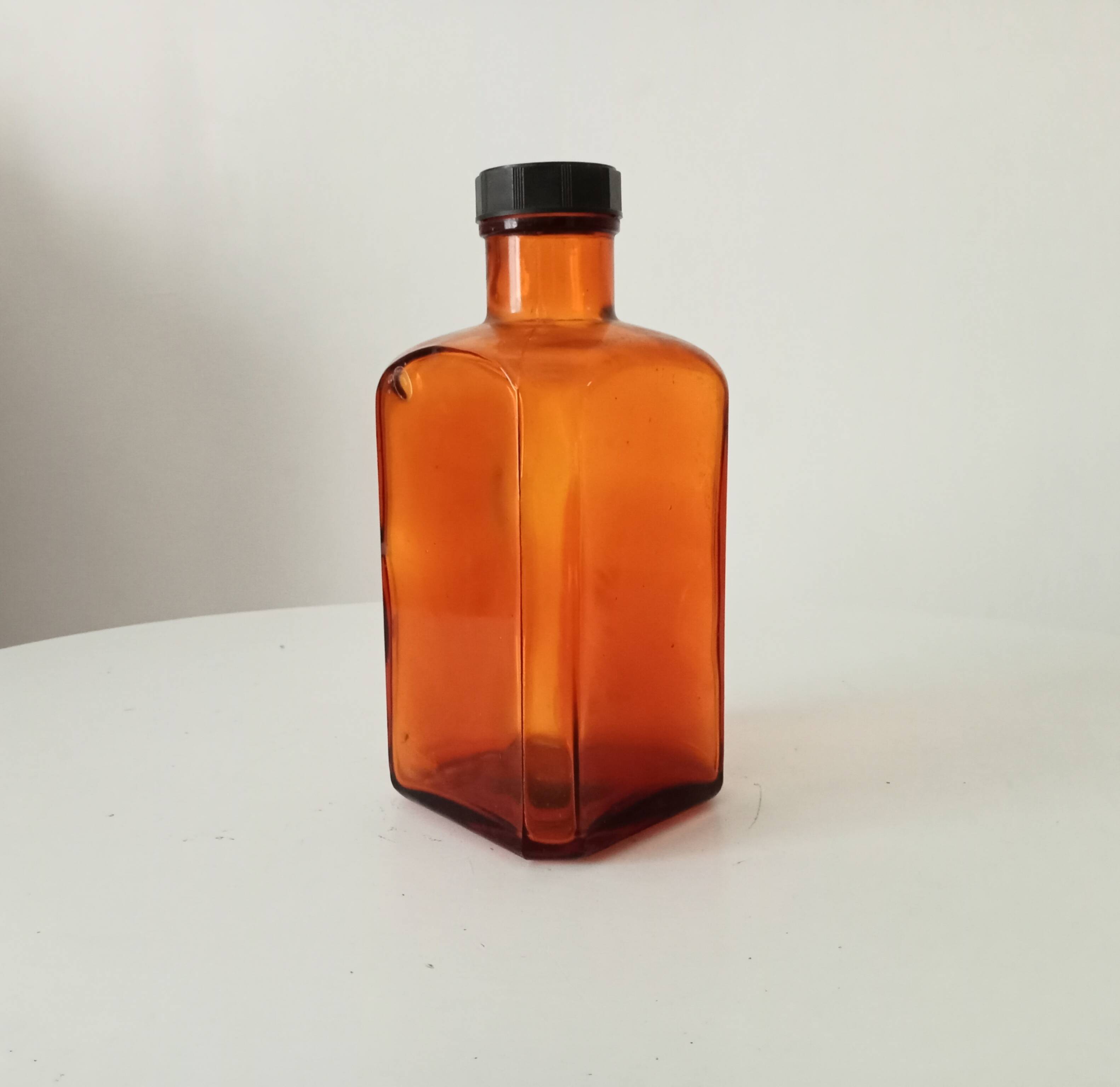 Old amber pharmacy bottle