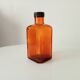 Old amber pharmacy bottle