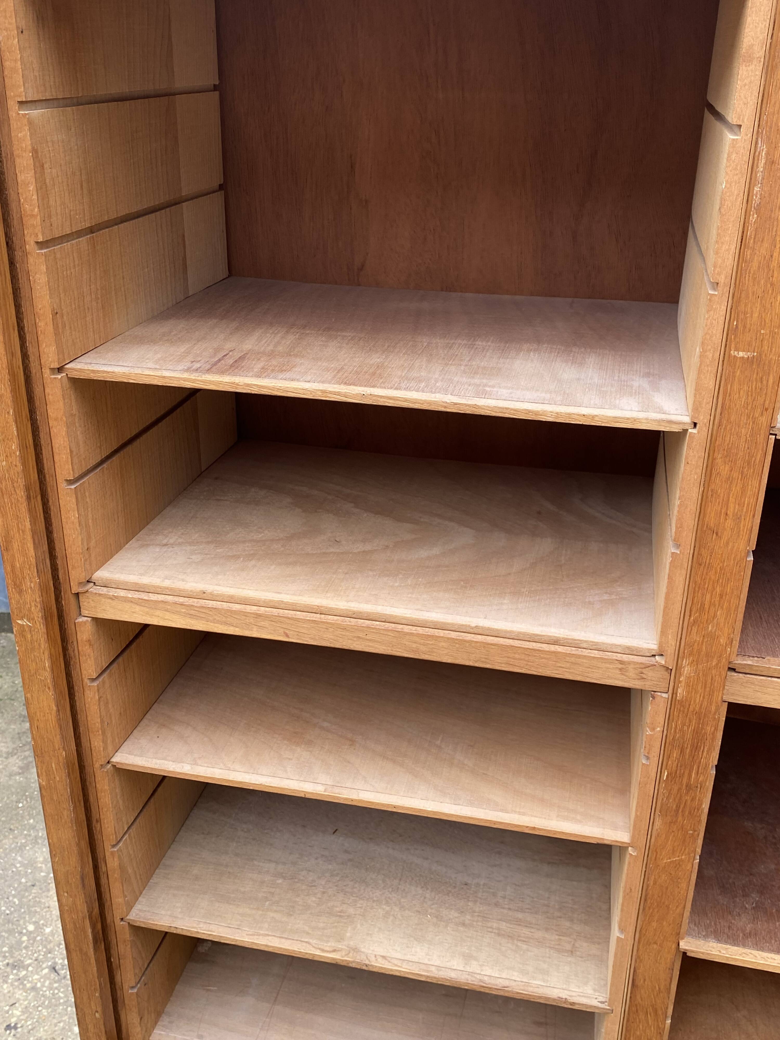 Double-column oak filing cabinet with curtains, 1950s.