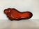 Red ceramic footprint catchall.