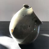 Hand has coarse salt in sandstone