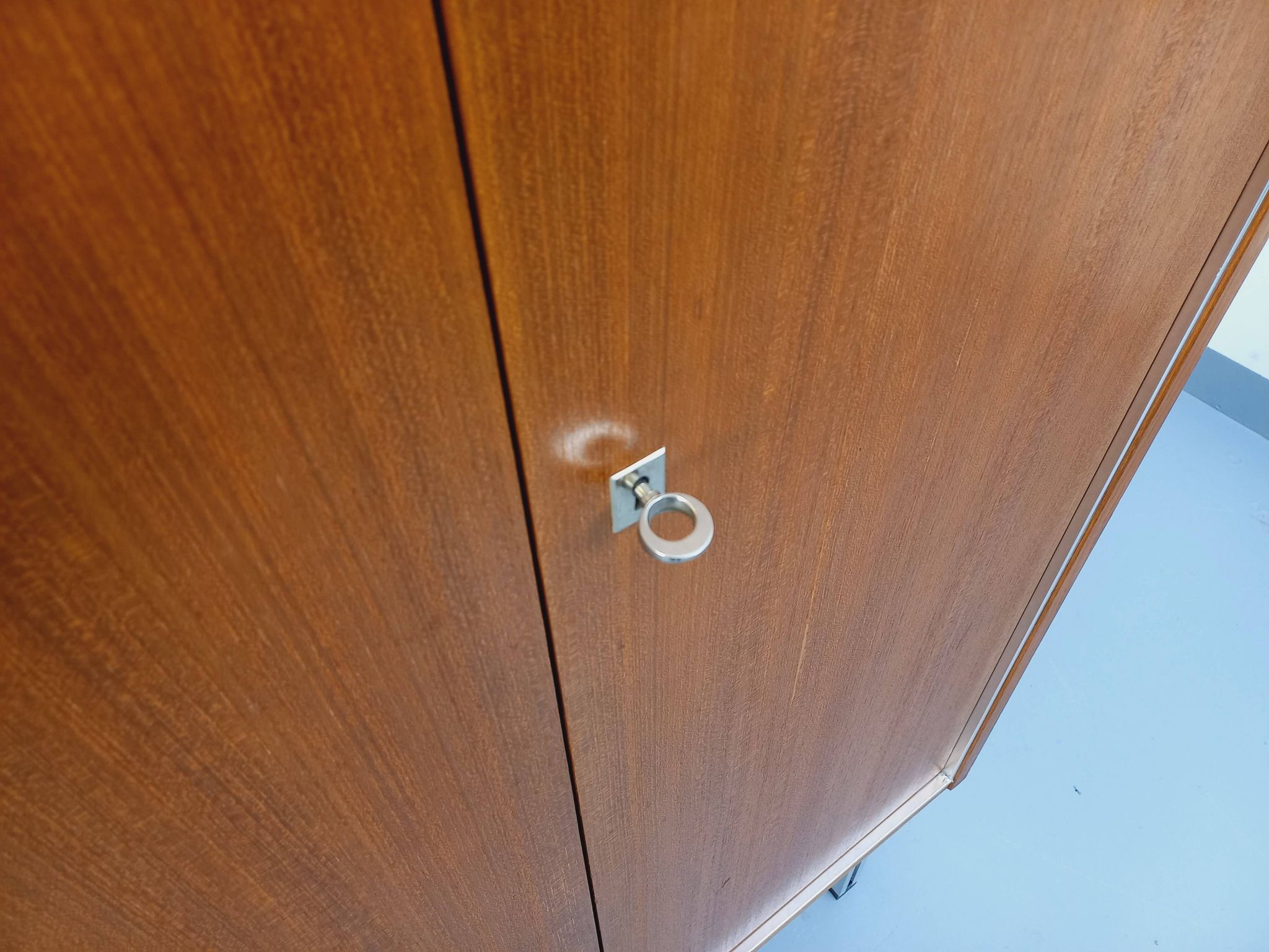 Vintage Scandinavian modernist wardrobe in teak and metal from the 1960s.