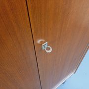 Vintage Scandinavian modernist wardrobe in teak and metal from the 1960s.