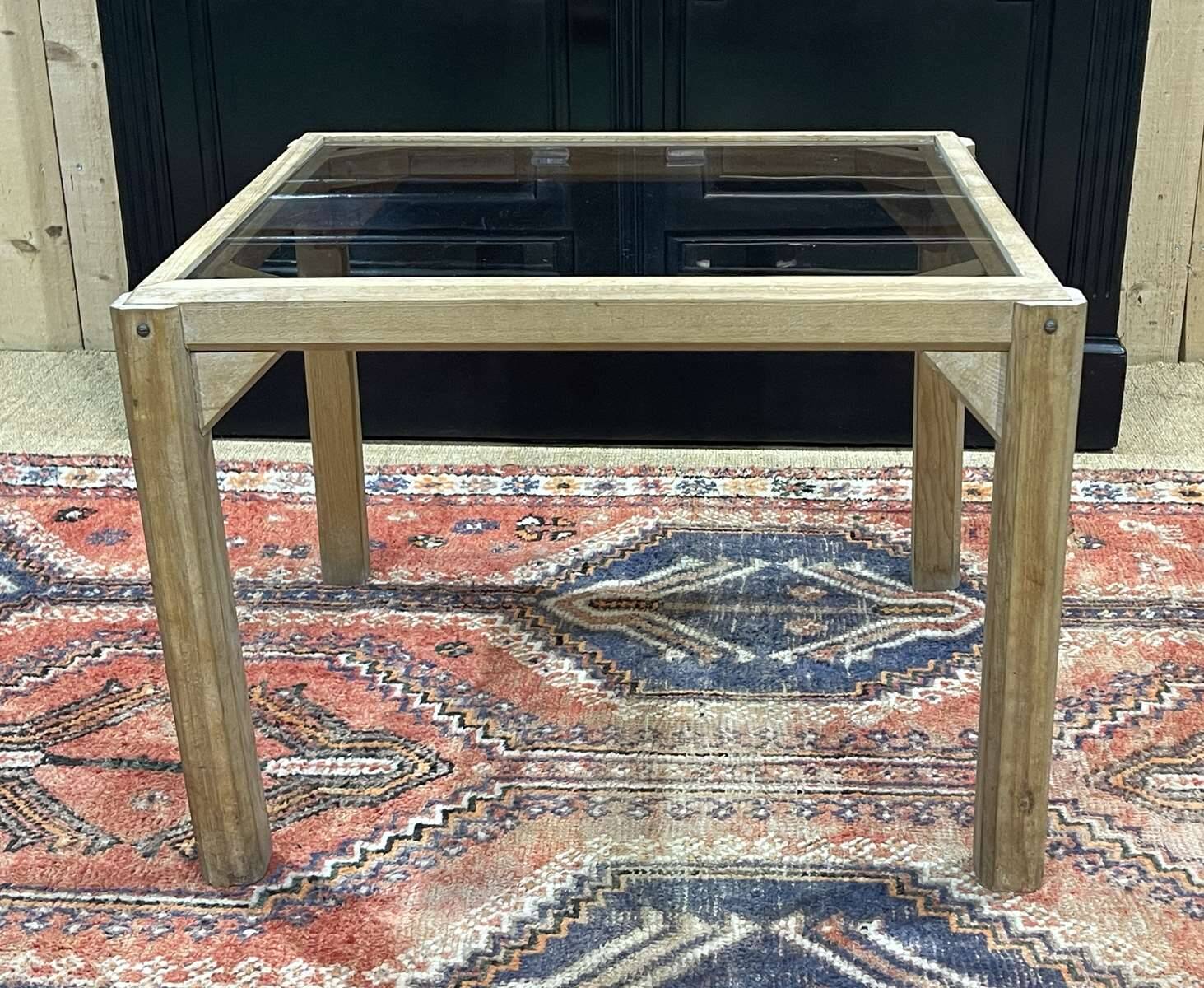 Coffee table in oak with a glass top, dating from the 1950s