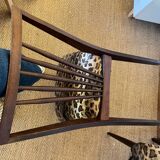 Pair of vintage wood and leopard chairs