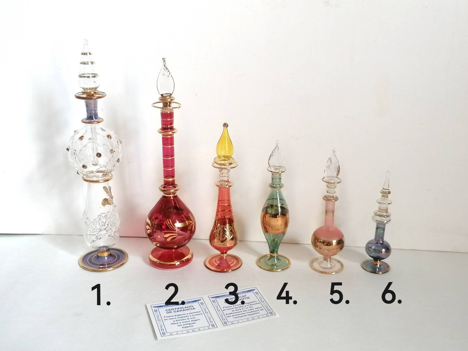 6 Egyptian gold and mouth-blown perfume bottles
