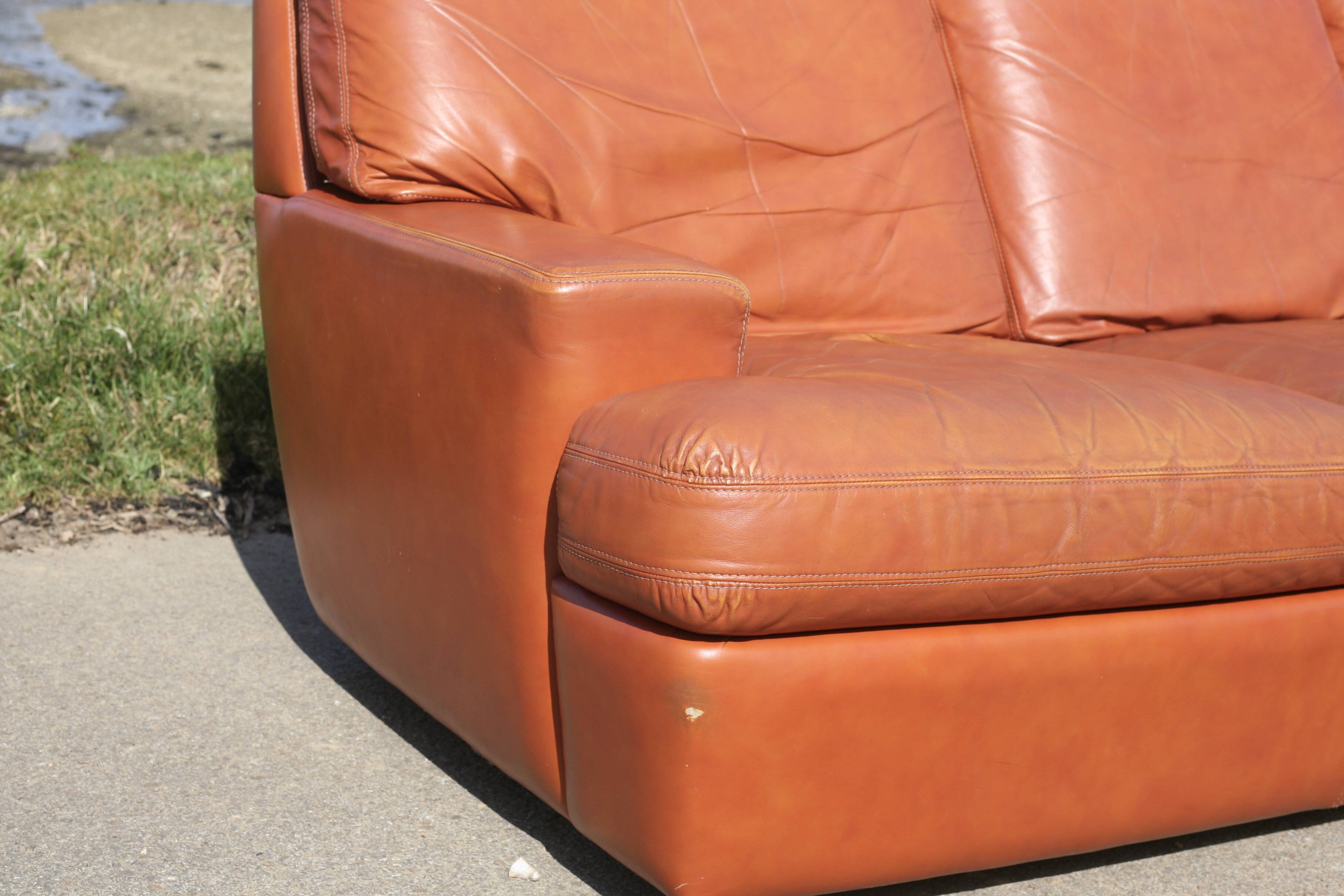 Space age sofa. Tan leather. Circa 1970