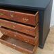 Vintage commode revamped in matte black & wood with warm tones.