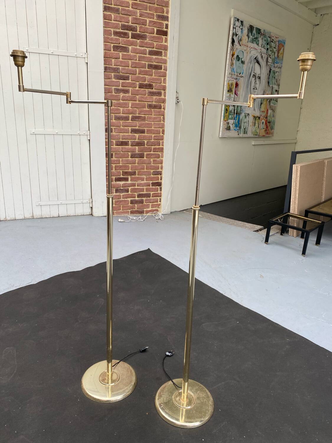 Pair of articulated floor lamps